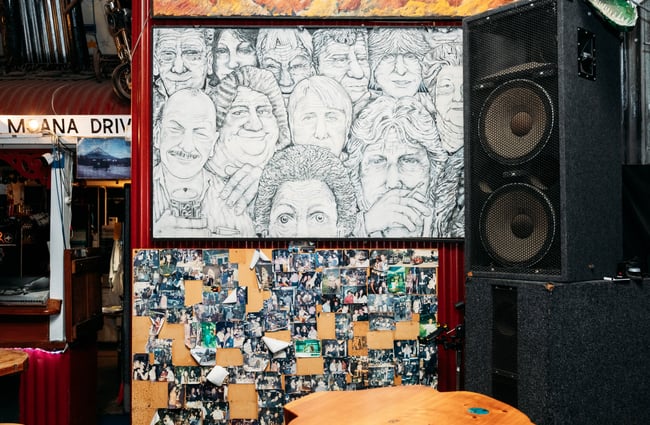 Two artworks on a wall.