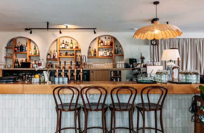 Bar area with stools at Sofi.