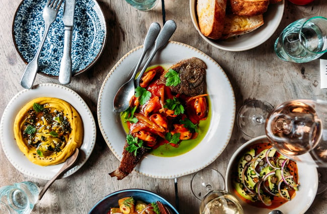 A selection of food dishes on the table at Sofi.