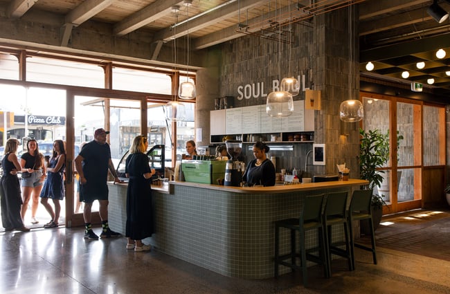 A large cafe counter inside a vast space.