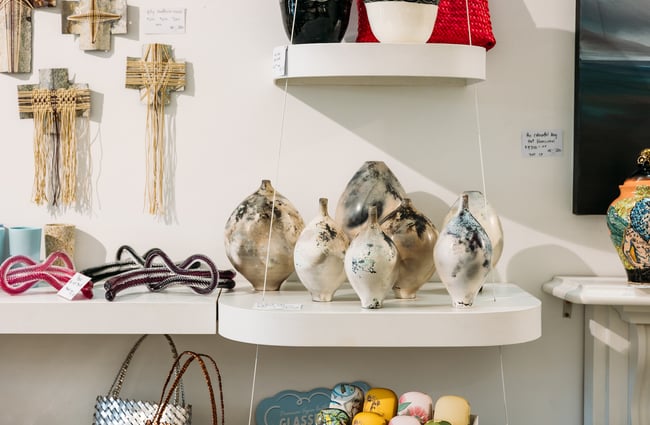 Ceramics on round shelves at Soul Gallery.