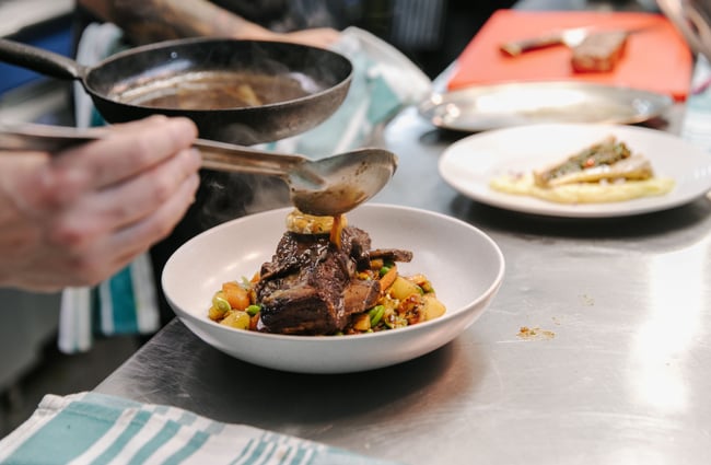 Milk stout braised ribs being prepared.