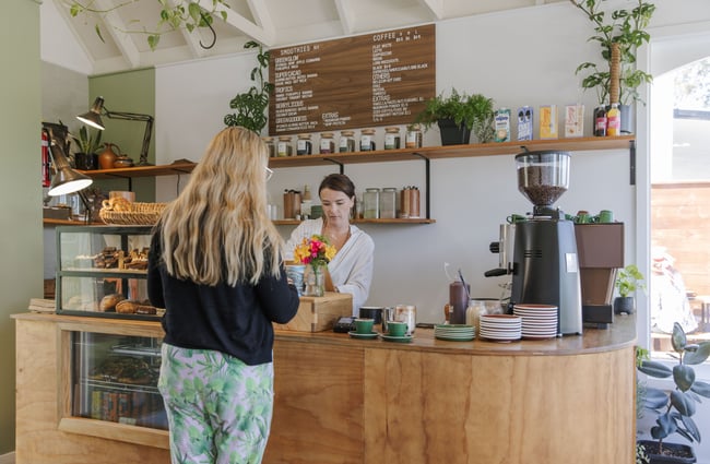 Customer at the counter at Soulful Coffee Diamond Harbour.