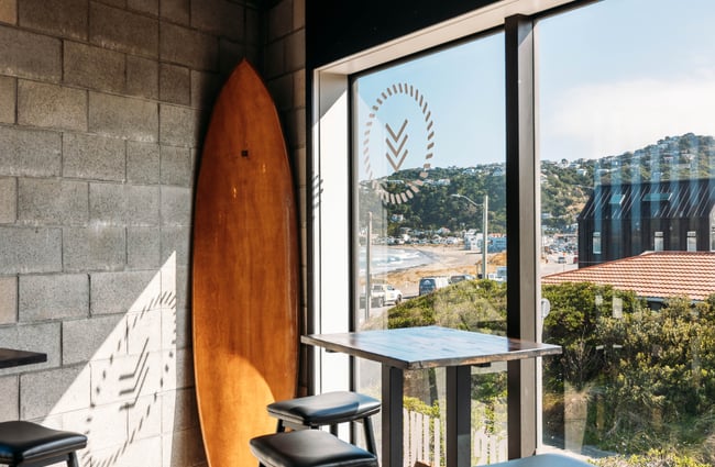 A view of the beach from a bar.