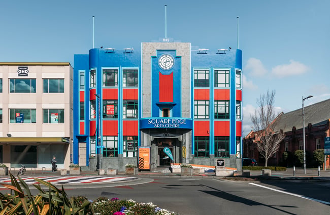 The exterior blue and red building.