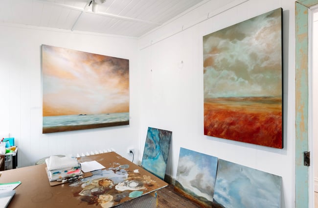 Works of art on display in a gallery.