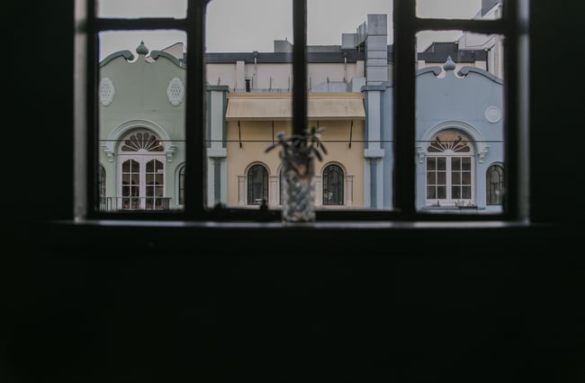 The view from the first floor of Story, looking across to the iconic pastel-hued historic facades of New Regent Street in Christchurch.