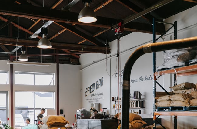 Sublime Roastery and Brew Bar mural on the wall. .