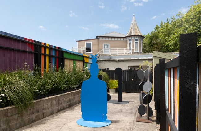 Courtyard with colourful sculptural pieces at Suite Gallery in Auckland