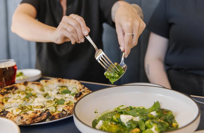 Close up of a pizza and gnocchi at Sumner Post Office.