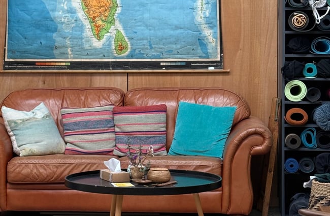Comfy couches and a print on the wall.