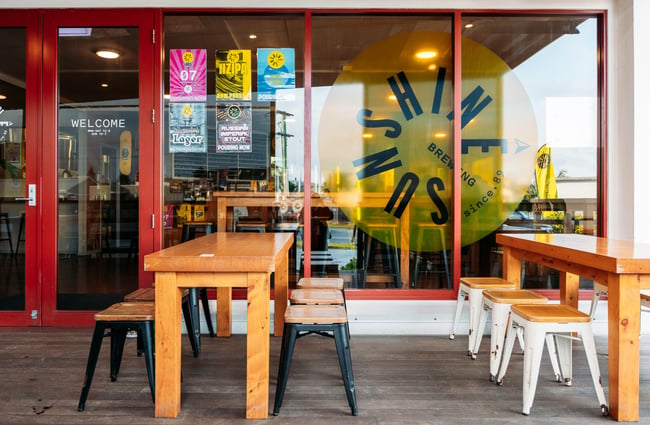 Tables and chairs outside Sunshine Brewery Gisborne.