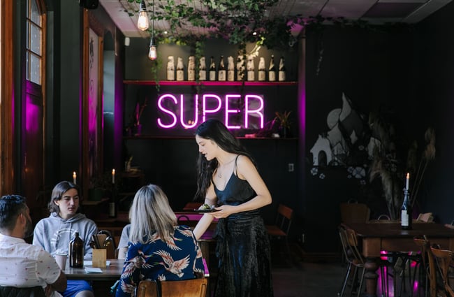Diners inside the restaurant at SUPER.