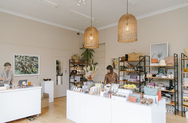 Woman browsing shop at Susan Badcock Gallery in Geraldine.