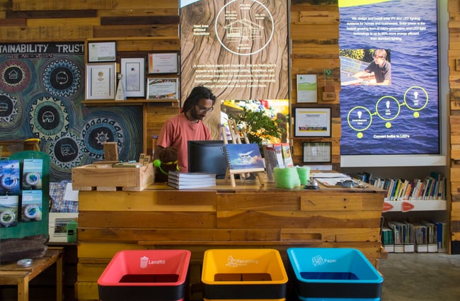 A man working behind the counter.