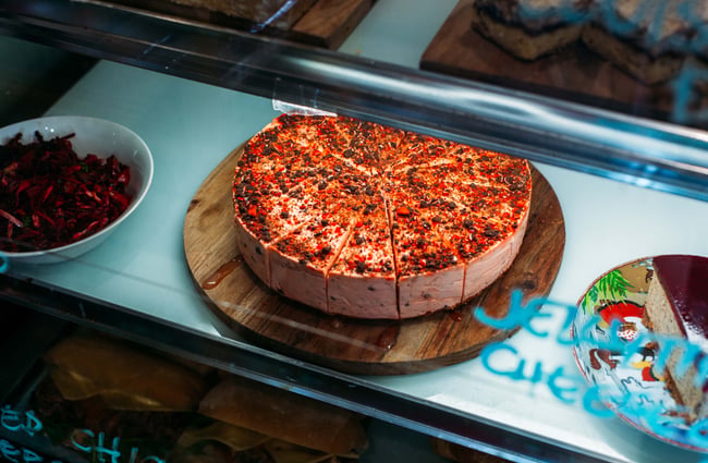 Cheesecake in a cabinet at t bay cafe, Porirua.