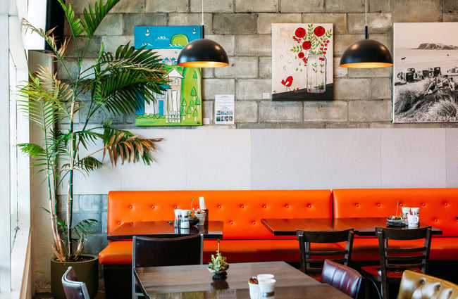 Orange bench seat at t bay cafe, Porirua.