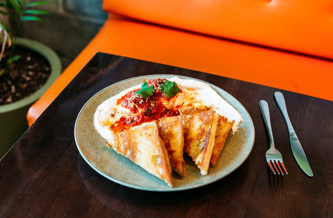 Toasted sandwiches on a table at t bay cafe, Porirua.