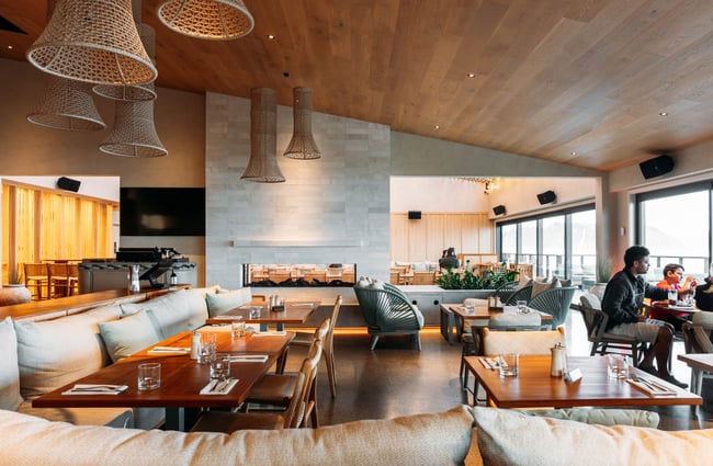 Large comfy looking sofas in an open restaurant.