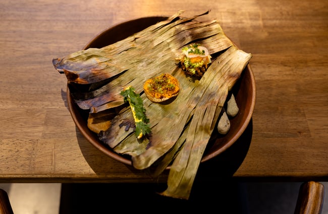 A plate of cooked food on a table.