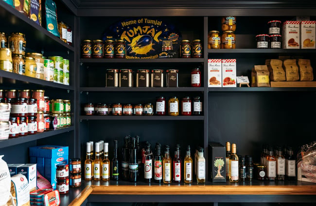 French-inspired deli items on cafe shelf