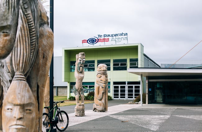 Arena with a Maori sculpture out the front.