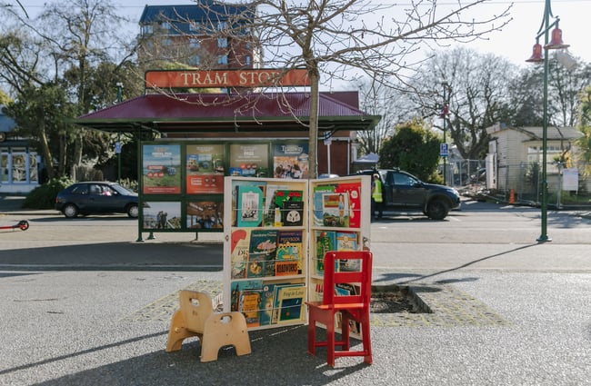 Kids secondbook shop area at The Custard Square Bookshop with the tram sign and road in the background