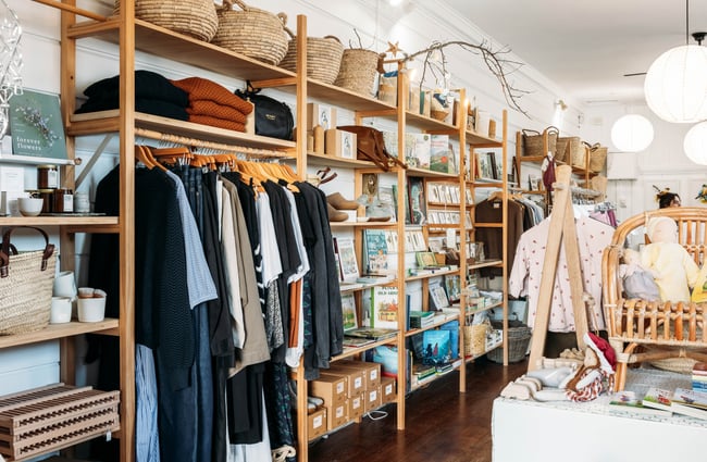 Racks of clothes on display inside The Aviary Gisborne.