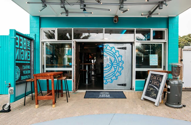 The front exterior of the blue Beer Engine building.