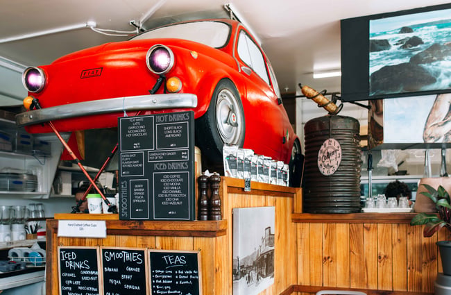 Red car in a cafe