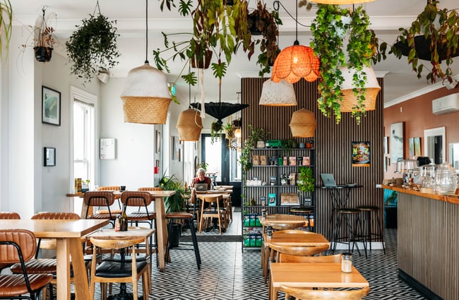 The inside of a brightly coloured cafe.