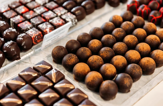 Rows of specialty chocolates at The Chocolate Story.