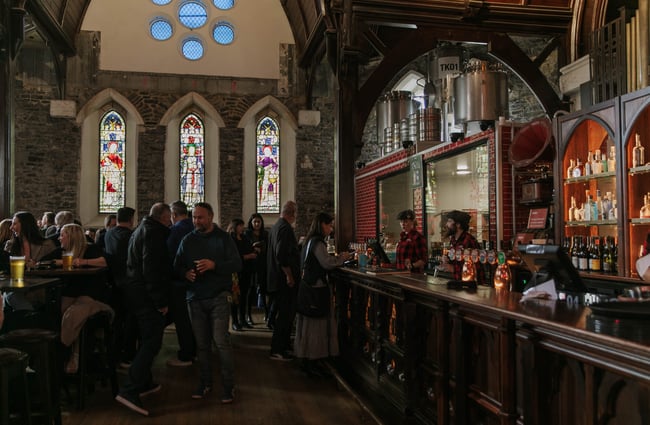 The busy bar inside The Church Pub.