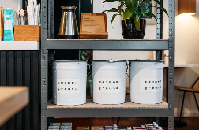 Common Ground coffee buckets at The Corner Store.