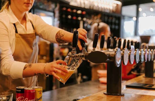 Close up of a beer being poured at Craft Embassy.