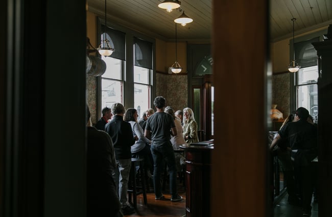 A busy bar interior inside Criterion Hotel.