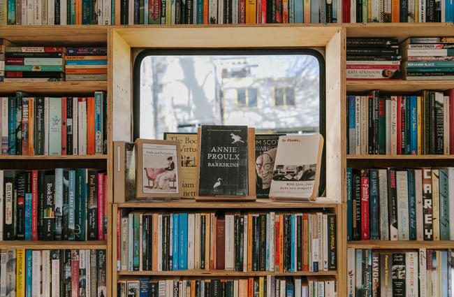 A close up of books on a wall inside the bookshop.
