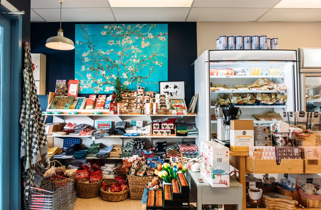 Selection of Dutch food products and deli items on shelves and in fridge