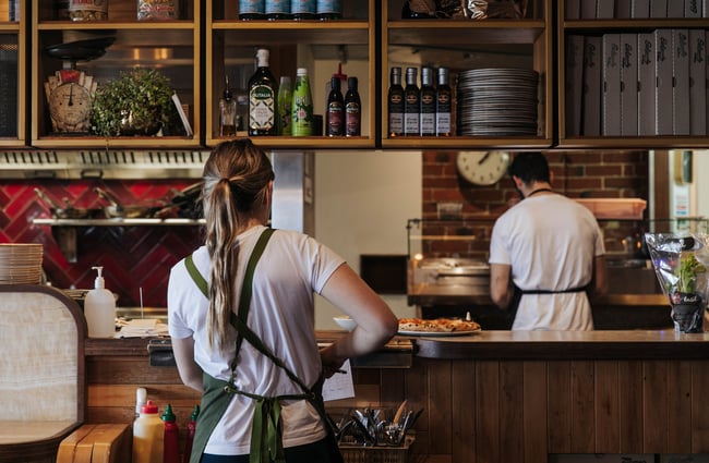 Staff working behind the counter.