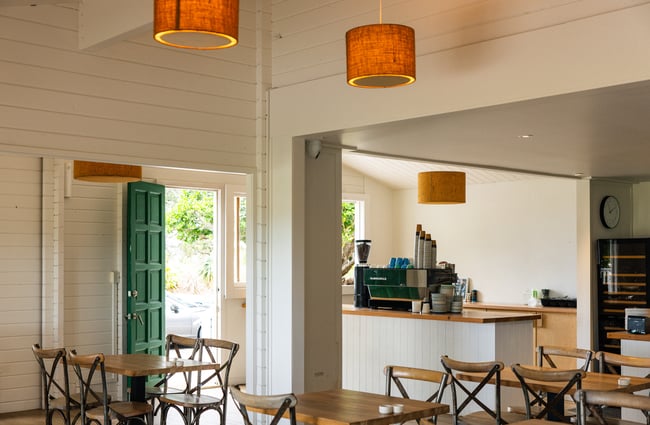 Dining space and coffee machine at The Farmers Daughter.