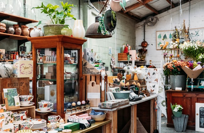 Interior of the Flower Crate store filled with potted plants and other items..