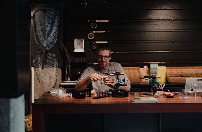 A man at work inside Patagonia's Fly Bar in Queenstown.