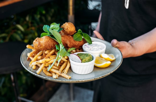 Fish and chips on a plate.