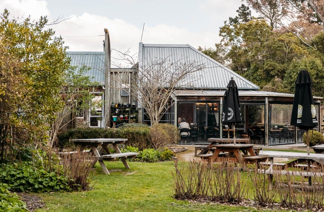 Tables outside the main building of The Herb Farm.