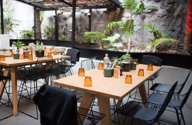 Outside seating with table setting.