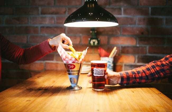 A table of chips and beer.
