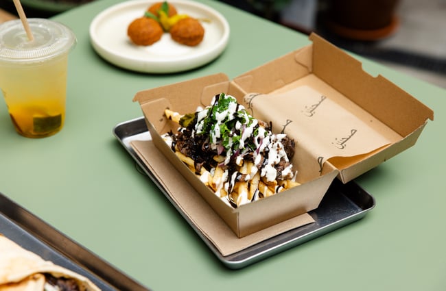 A close up of loaded chips in a box.