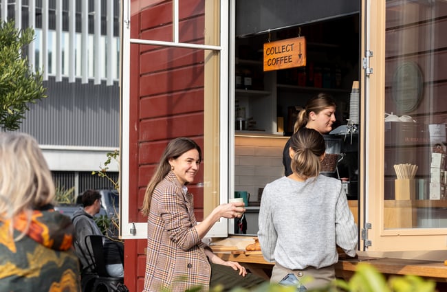 Customers enjoying a coffee outside at The Lil Brew Espresso Bar.