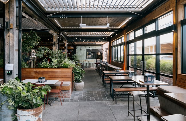 Overview of outdoor courtyard at Little High Eatery in Christchurch