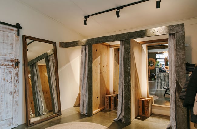 Two empty dressing rooms inside The Little Red Fox store in Fairlie.